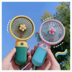 Mini handheld fan USB rechargeable with fruit design for portable personal cooling in Pakistan